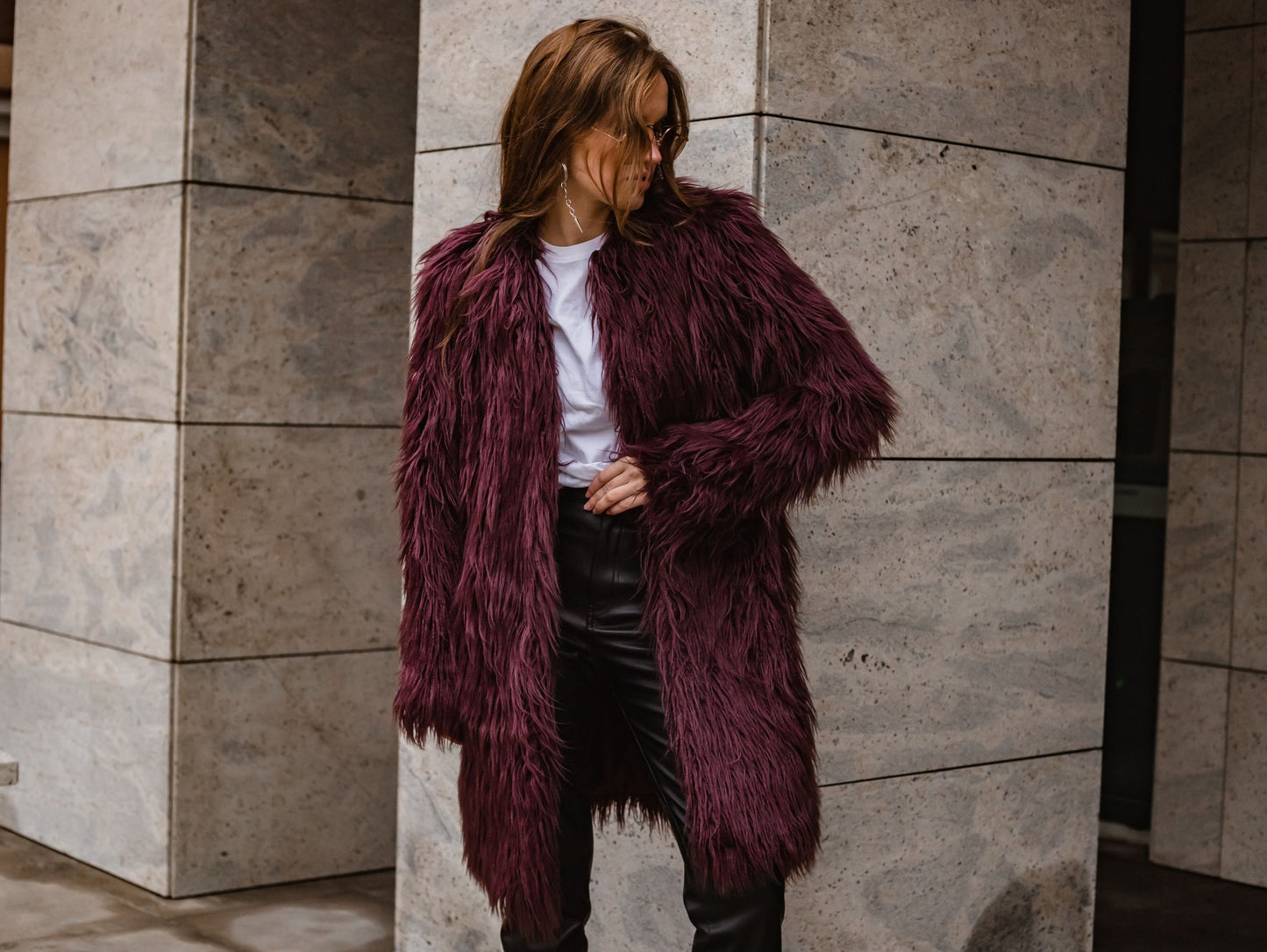 Long collared faux fur coat