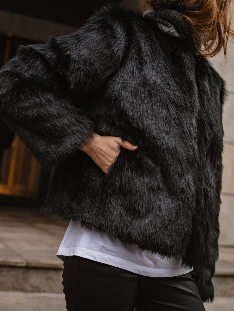 Black cropped wolf faux fur jacket